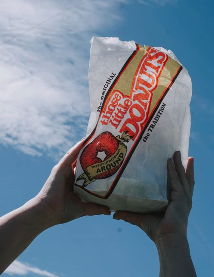 Donut bag held in the sky