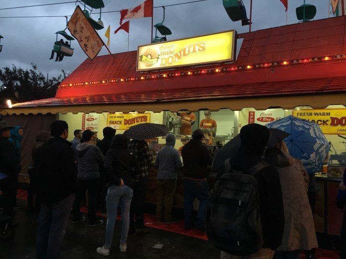Night event crowd at donut booth